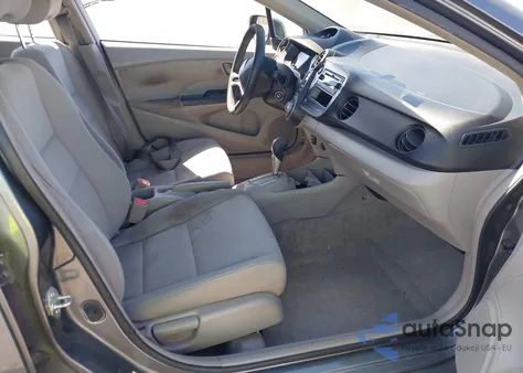 2011 Honda Insight from USA, damaged, VIN JHMZE2H32BS003362